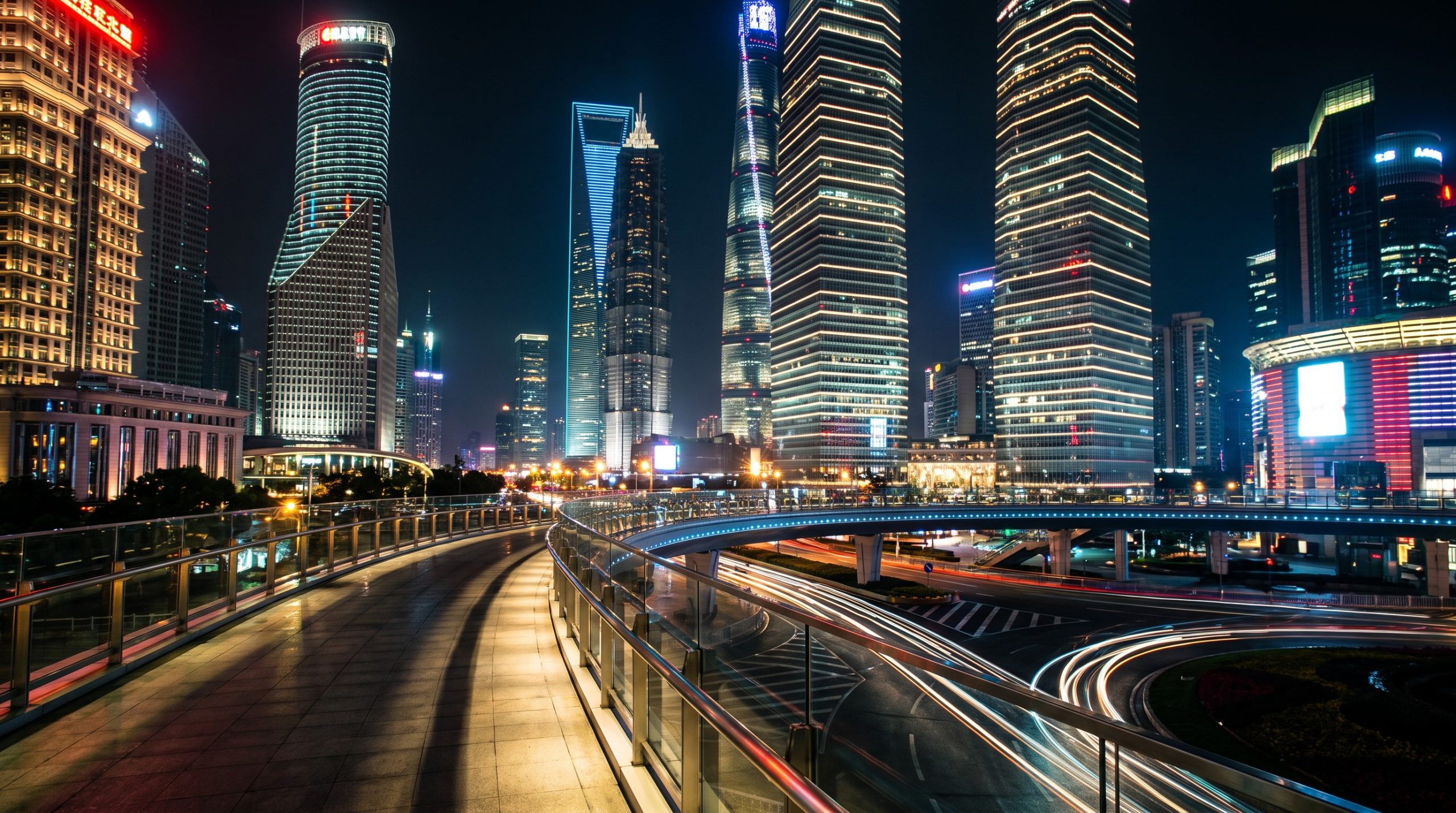 Futuristic neon-lit skyscrapers of Lujiazui district in Shanghai at night