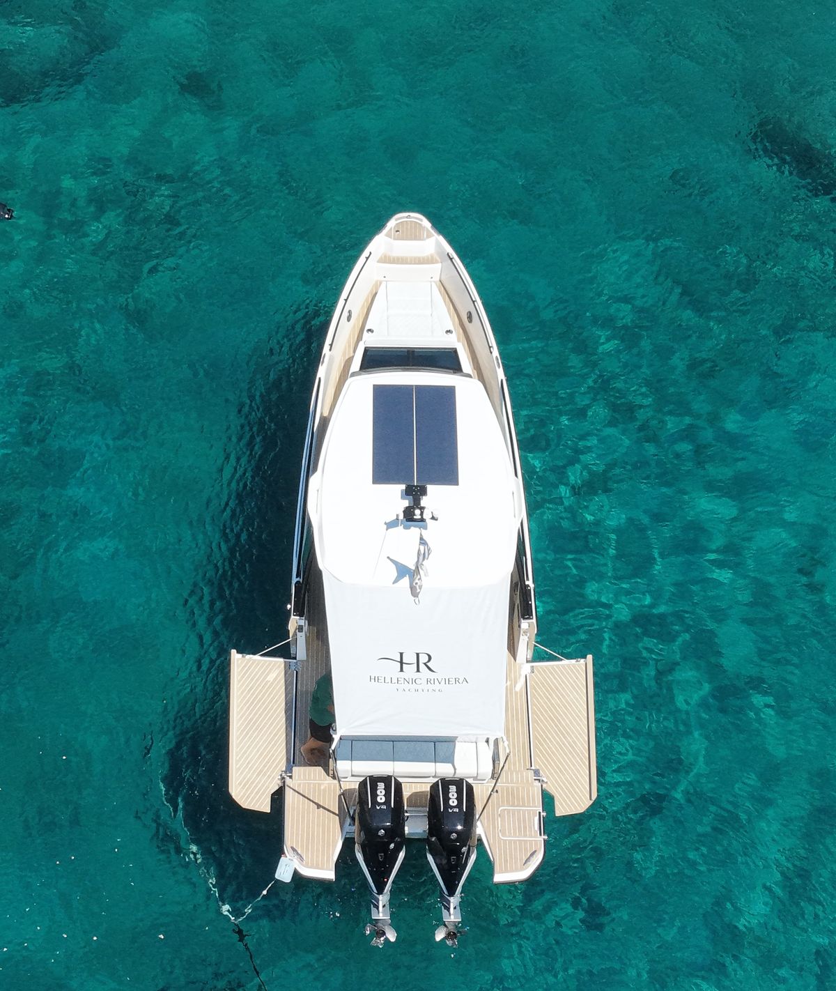 The Eothini, Hellenic Riviera Yachting's Saxdor 320 GTO, anchored in turquoise water